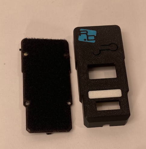 DTT PCB with loop velcro next to trainer case