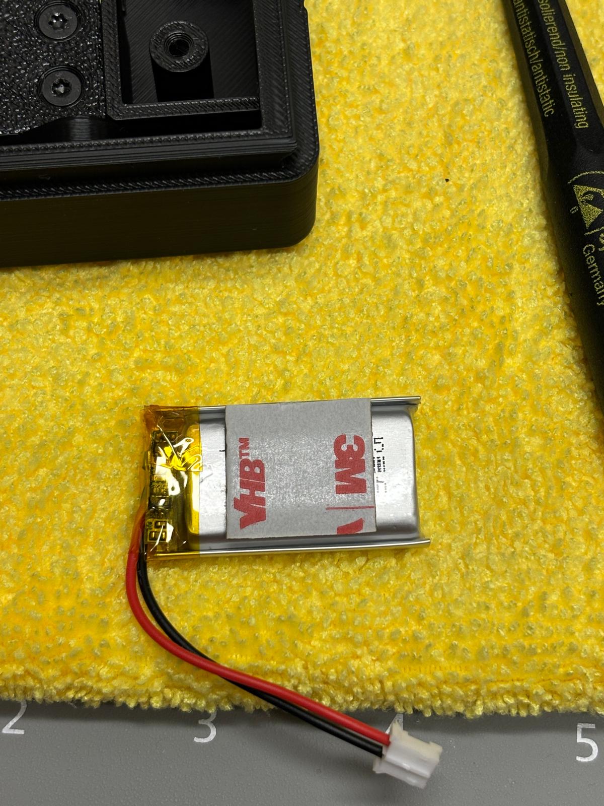 VHB tape applied to battery