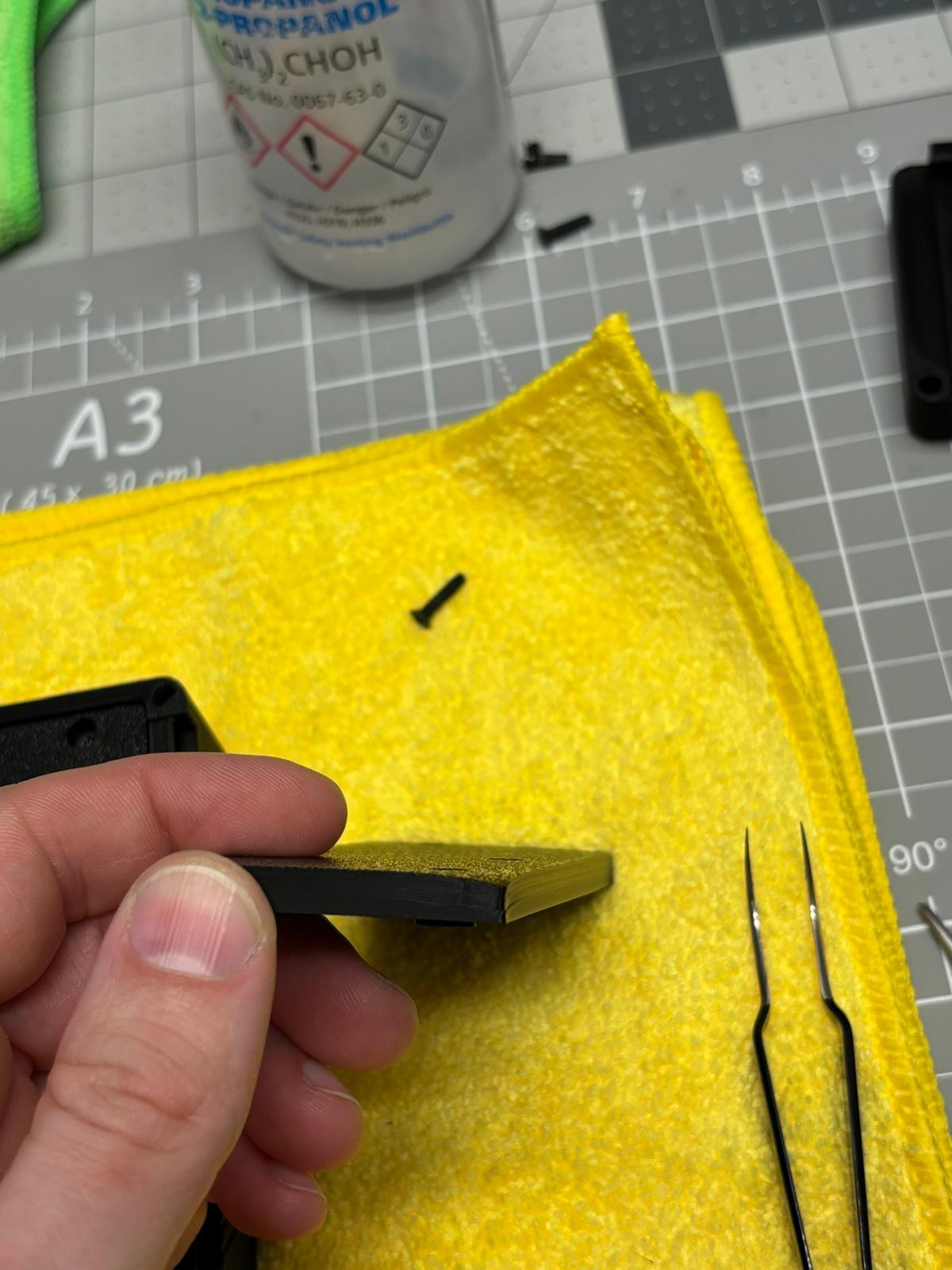 Applying superglue to magnet insert with a paperclip