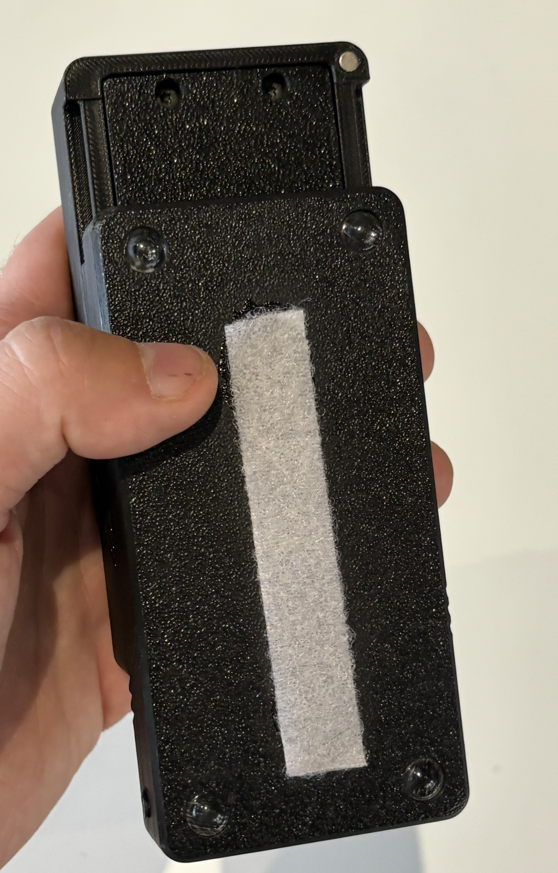 Backplate sliding onto housing
