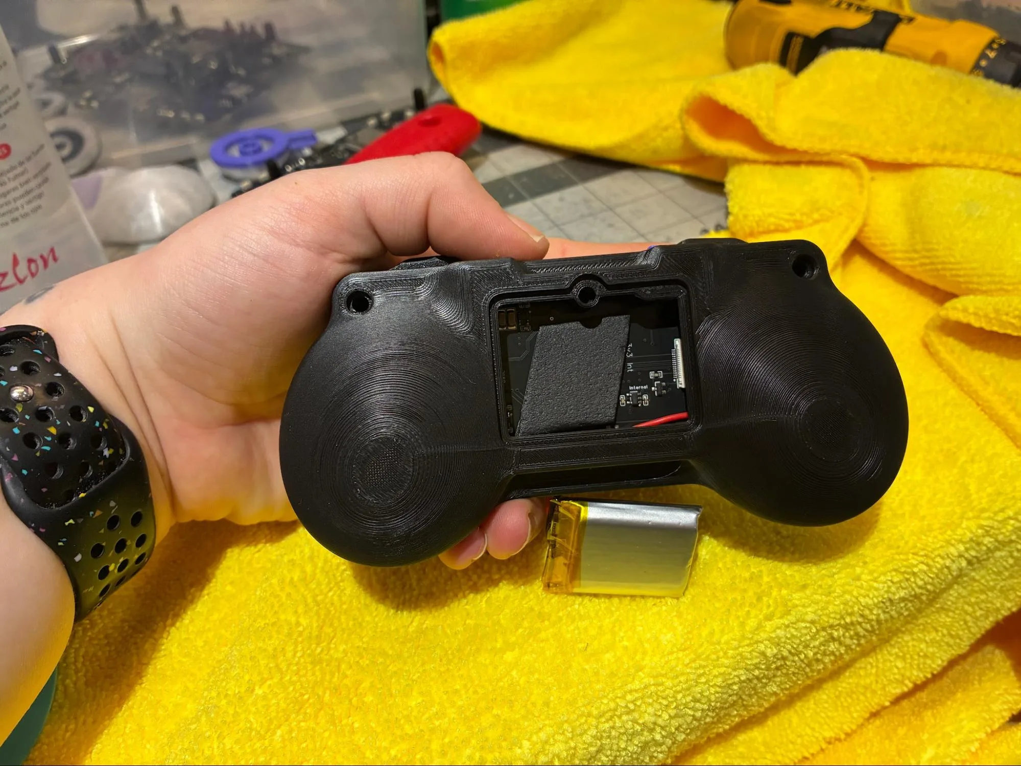 Battery pulled through the RADR back housing battery compartment opening