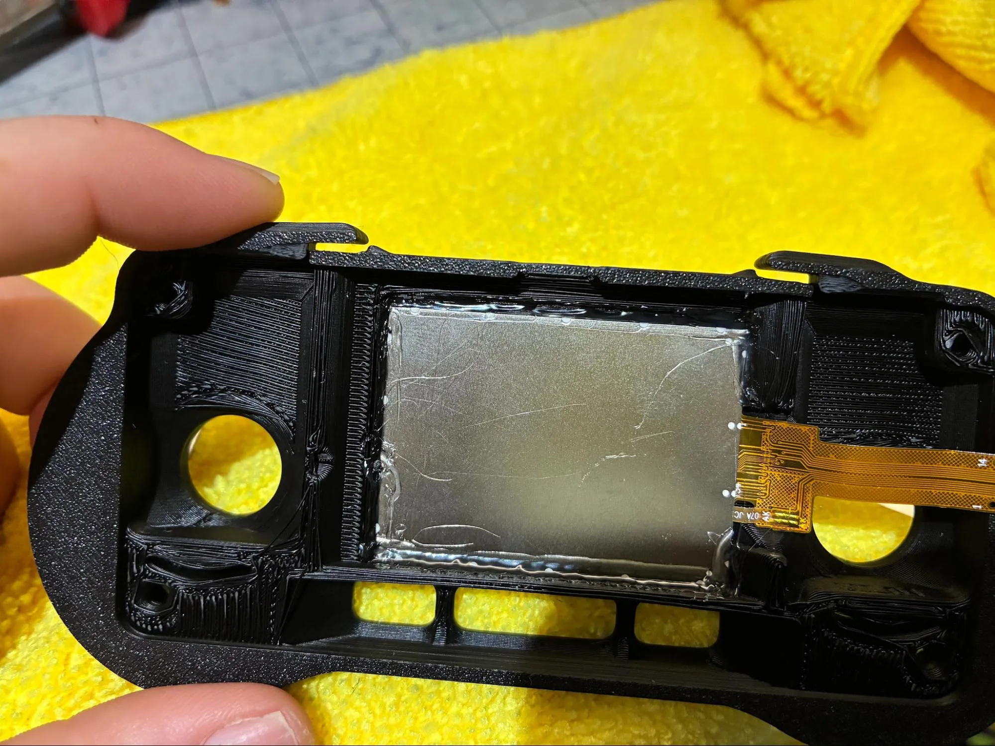 Hot glue bead around the RADR display edge