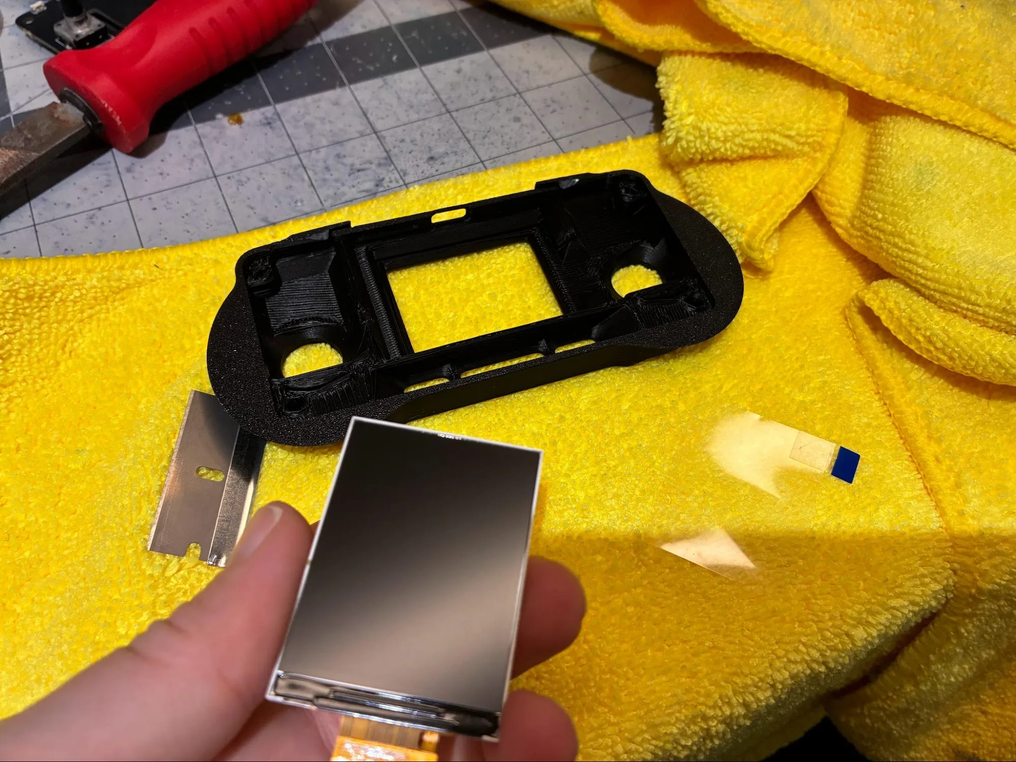Protective film being removed from the RADR display