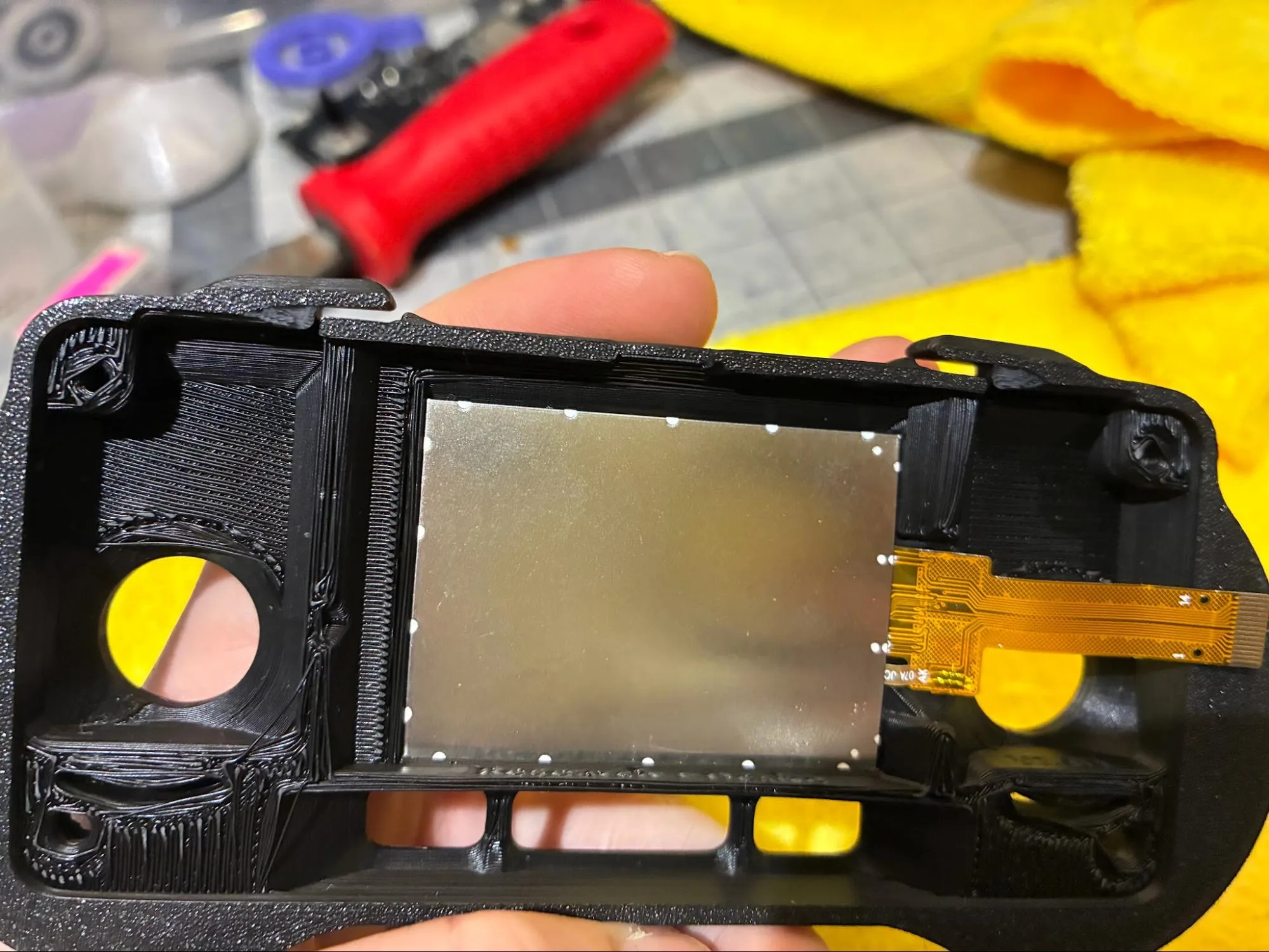 Display seated flush in the RADR front housing